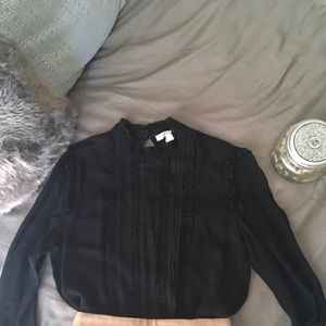 Sheer black blouse